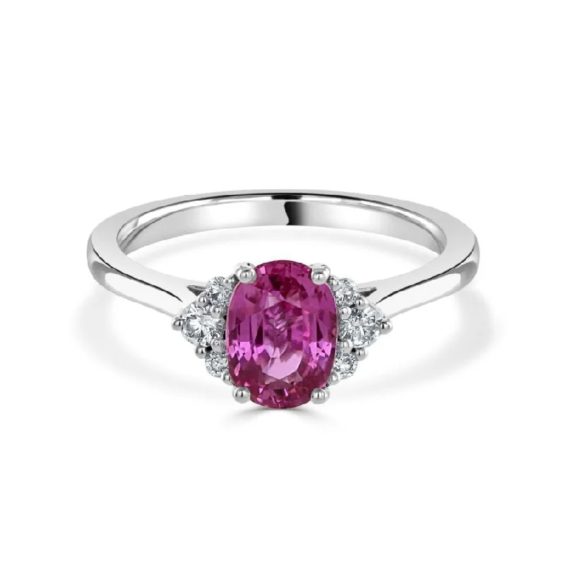 18ct white gold oval pink sapphire and diamond trefoil sides ring all claw set