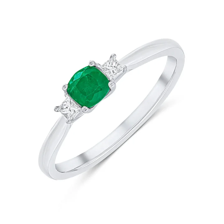 18ct white gold cushion cut Emerald and princess cut Diamond claw set three stone ring